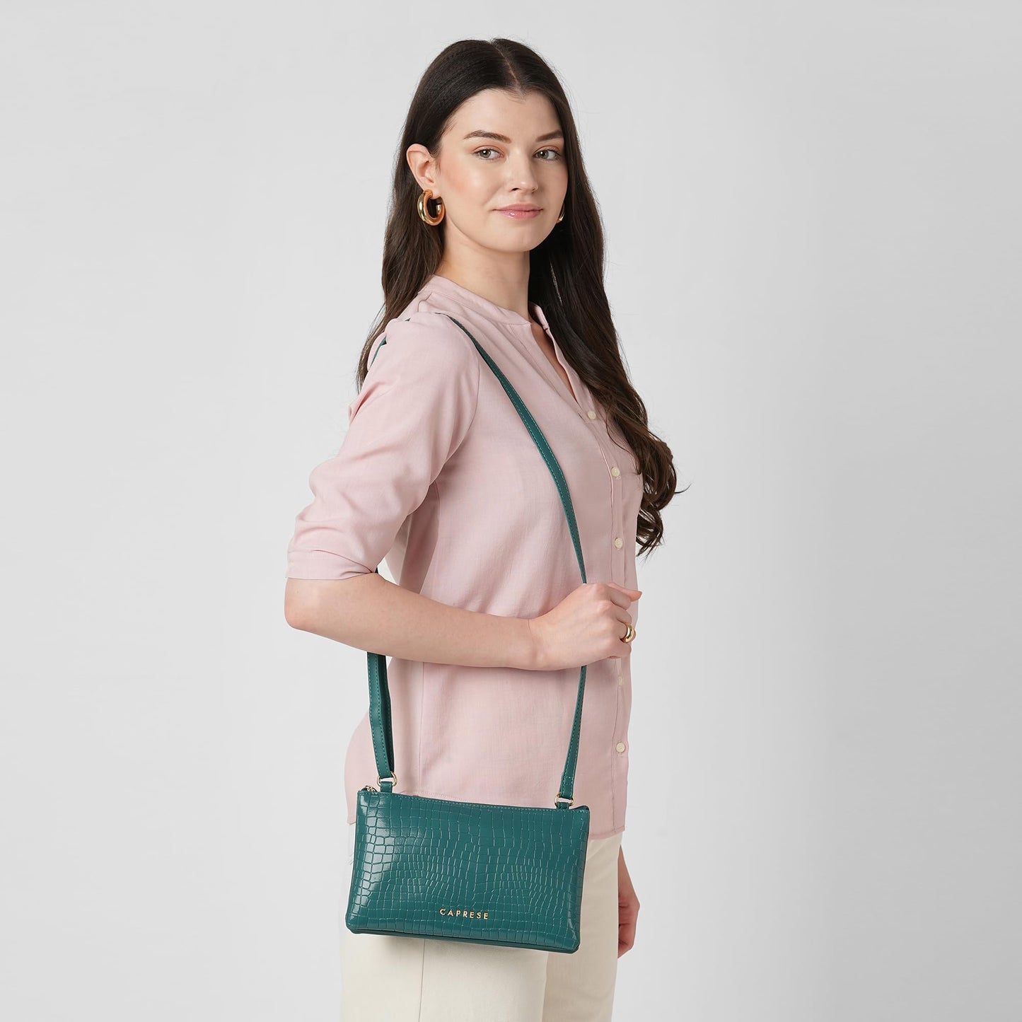 Caprese Suzie Sling Medium Bag for Women | Stylish Sling Bag with Adjustable Strap, Secure Zip Closure for Comfortable Wear | Versatile Handbag for Everyday Use, Travel & Special Occasions (Teal Blue)