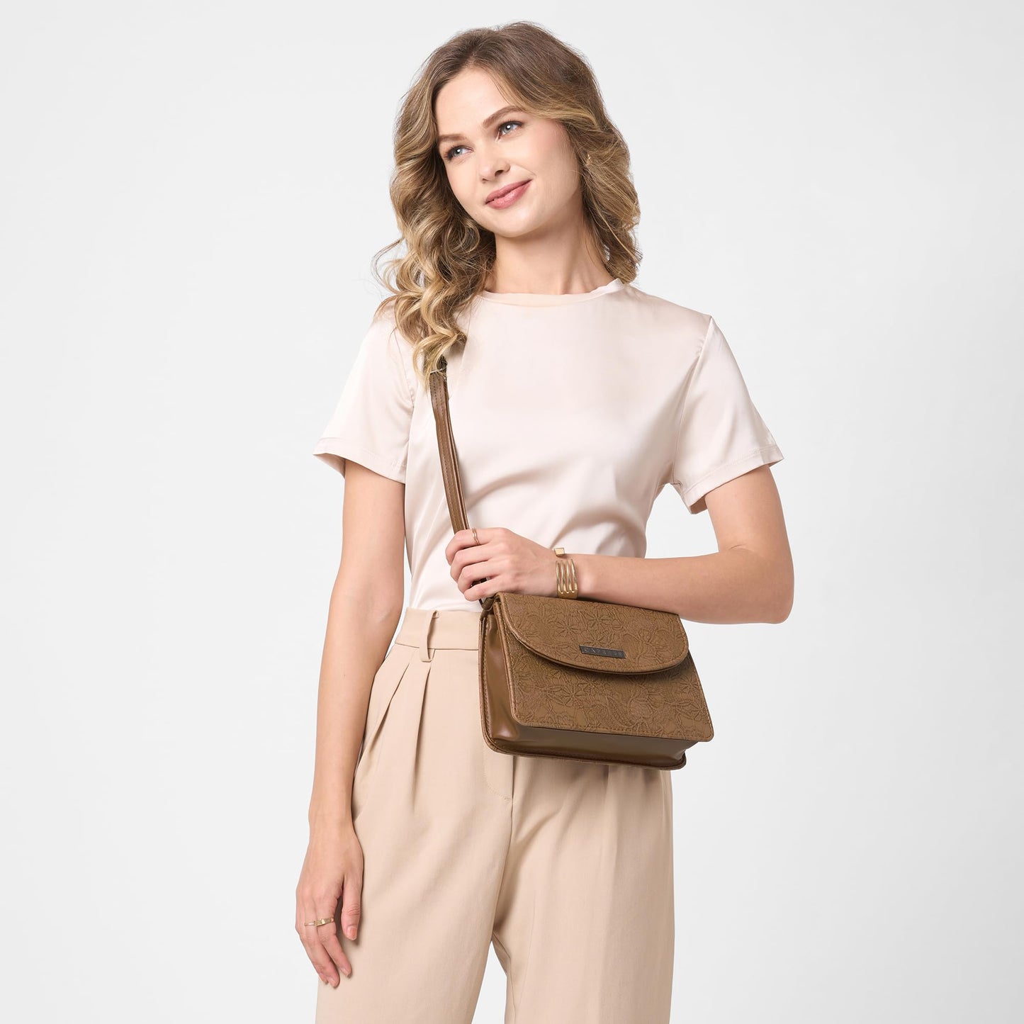 Caprese Flowy Medium Sling Bag for Women with Adjustable Strap & Magnetic Button Closure for Comfortable Wear | Versatile Handbag for Everyday Use, Travel, and Special Occasions (Brown)