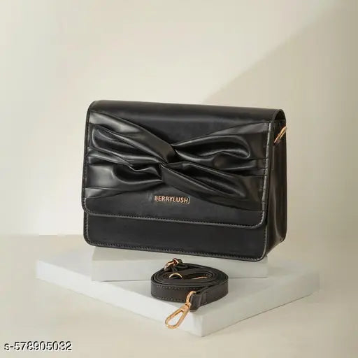 Berrylush Women Solid Black Synthetic Leather Detachable Strap Button-Up Twisted Front Embellished Regular Sling Bag