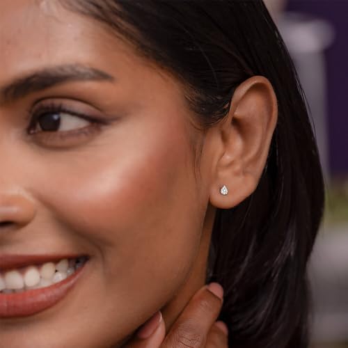 CaratLane 9 KT Yellow Gold Shimmering Pear Diamond Stud Earrings for Women