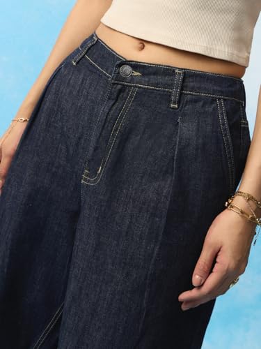 The Souled Store Baggy-Fit Denim: Atlantis Women and Girls Zip Fly Partially Elasticated Back Waistband Ink Blue Washed Cotton Denim Baggy Fit Front Pleat Detailing All-Season Jeans