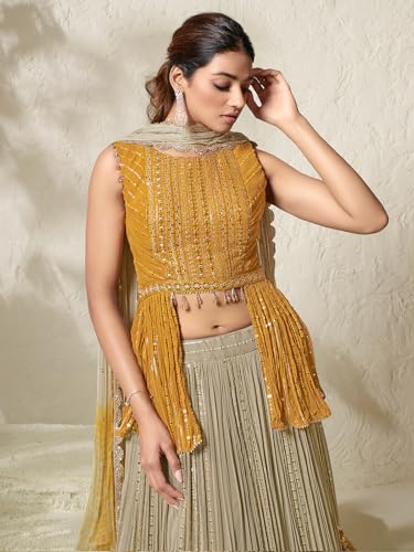 Woman's Stunning beige and yellow lehenga choli