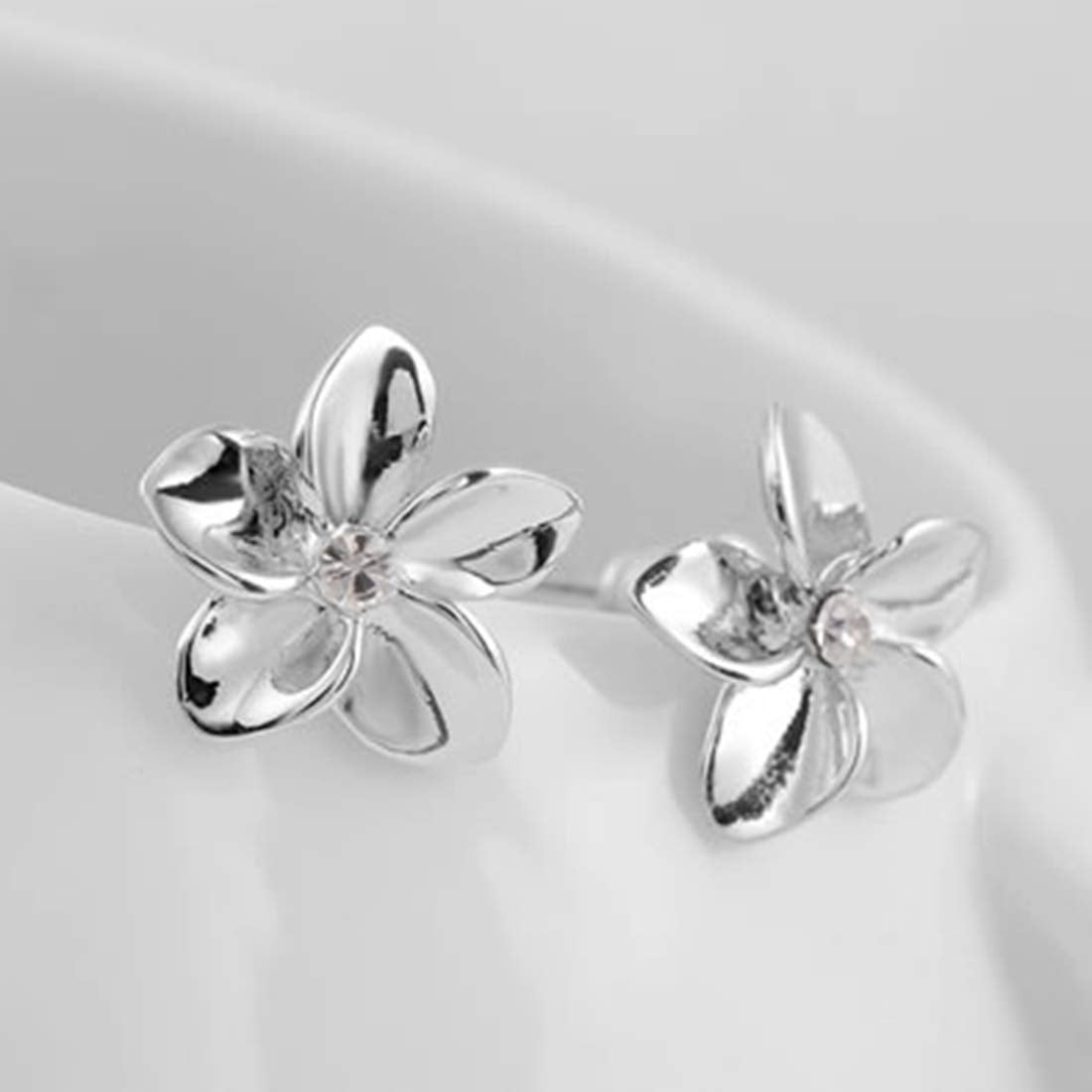 Peora Alloy Silver Plated Floral Diamond Cut CZ Stud Earrings for Women