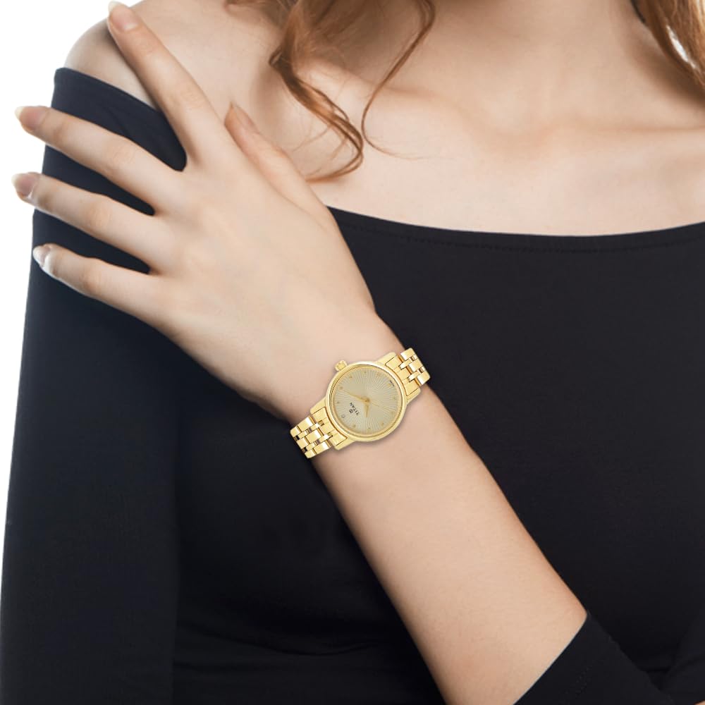 Titan Karishma Revive Analog Champagne Dial Women's Watch 2593YM01/NN2593YM01/NP2593YM01