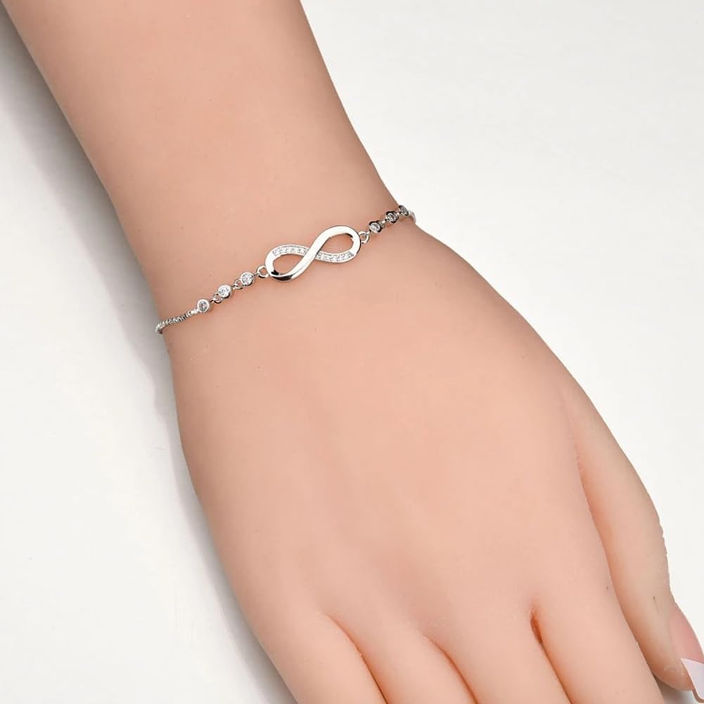 Shining Diva Fashion Latest Stylish Infinity Crystal Charm Silver Plated Bracelet for Women and Girls (10672b) Free Size