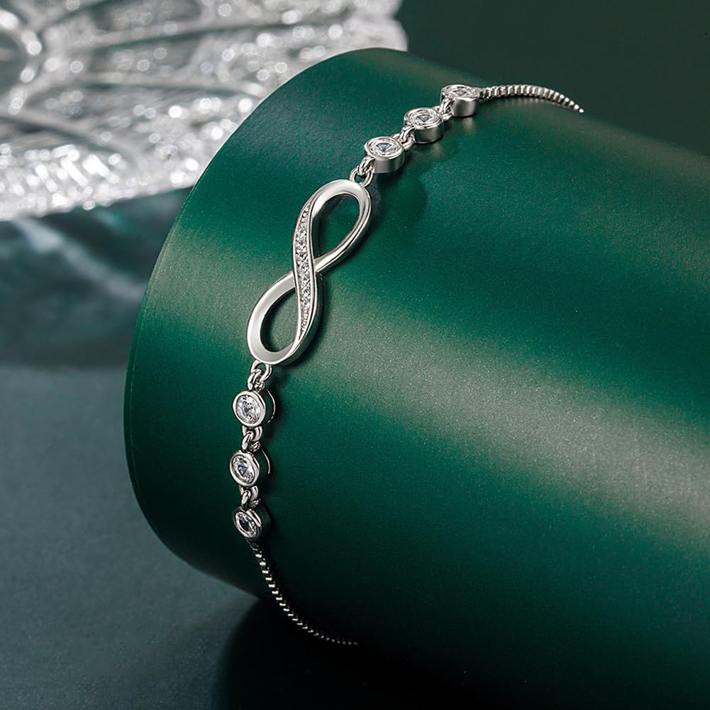 Shining Diva Fashion Latest Stylish Infinity Crystal Charm Silver Plated Bracelet for Women and Girls (10672b) Free Size