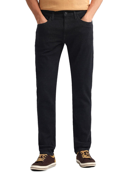 U.S. POLO ASSN. Men's Brandon Slim Tapered Fit Mid Rise Jeans (UDJENO1811_Black_32)