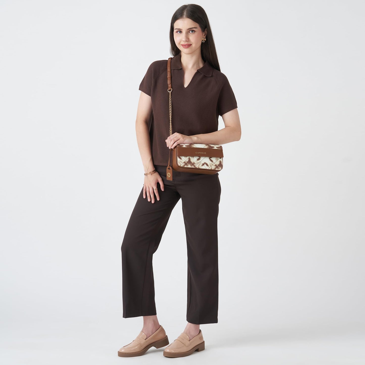 Caprese Shibori Medium Sling Bag for Women with Adjustable & Detachable Strap | Printed Faux Leather Shoulder Bag with Multi-Compartments | Zipper & Magnetic Button | Detachable Charm (Brown)