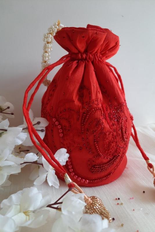 Pearl Embellished Red Round Potli Bag With Pearl Handle - SaumyasStore