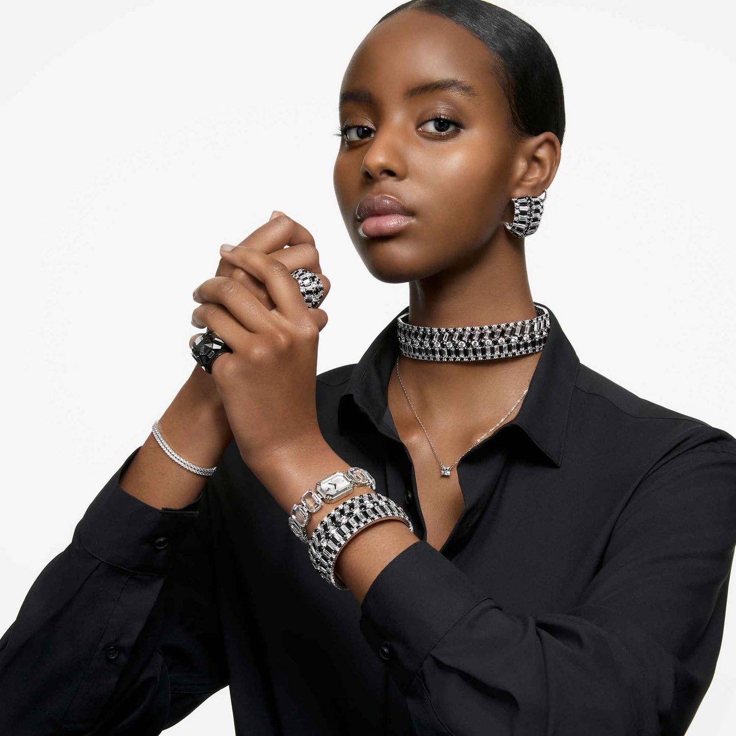 Swarovski Stainless Steel Analog White Dial Women's Silver Band Watch-5621173