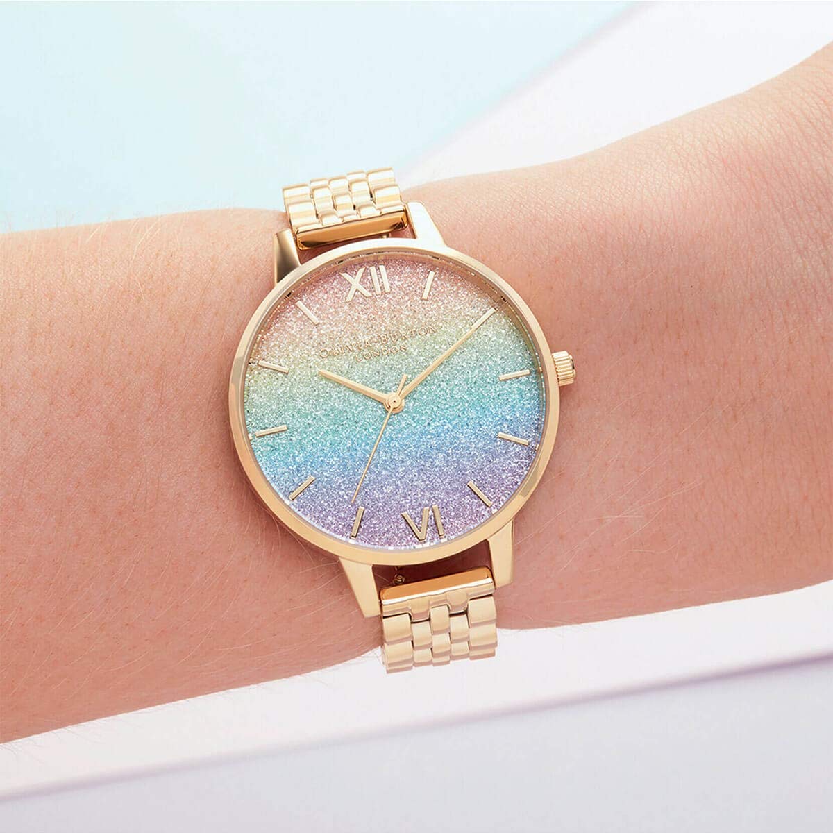Olivia Burton Rainbow Qtz Basic Rainbow Glitter Round Dial Women's Analog Watch|Ionic Plated Gold Steel Material|Gold Color Band - OB16RB23