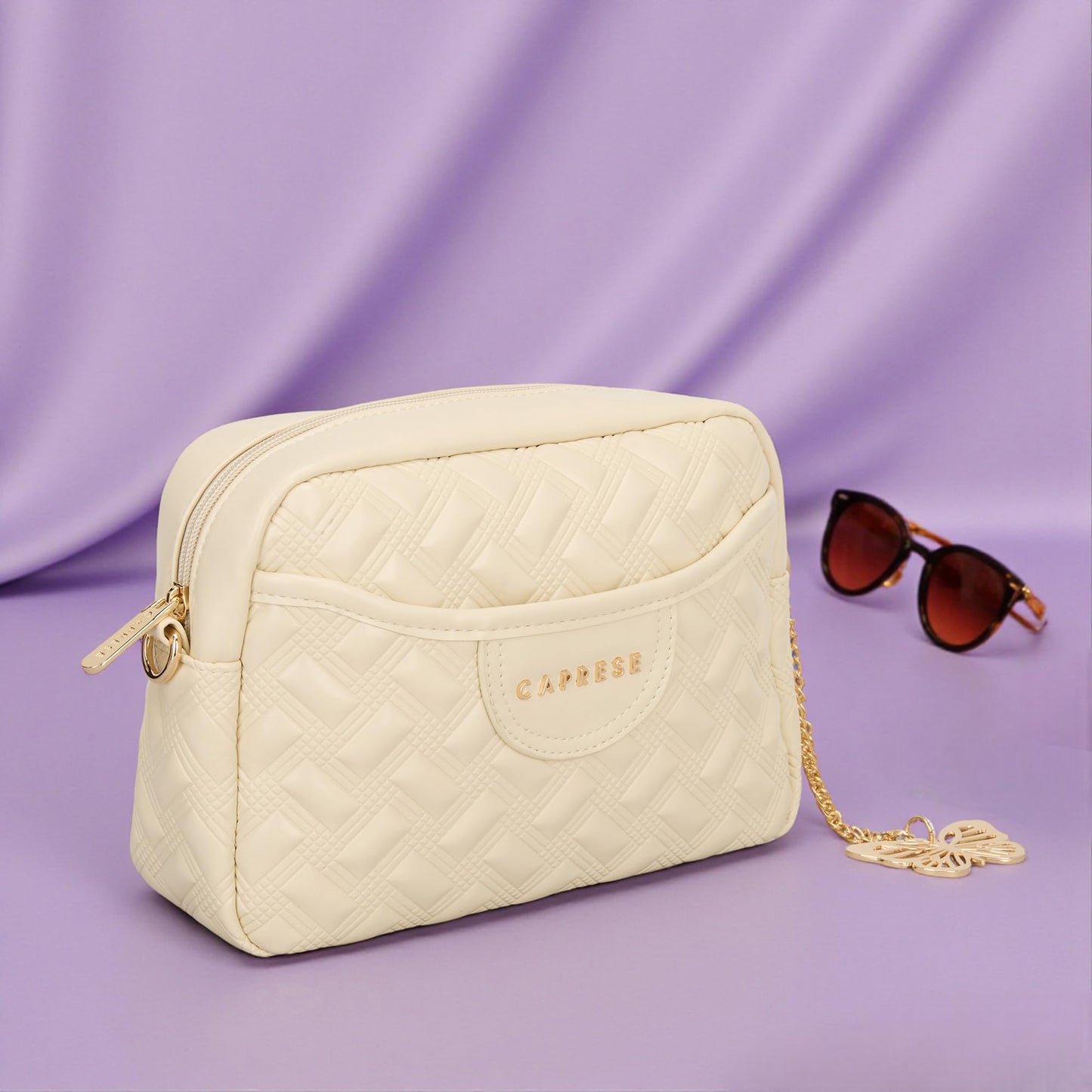 Caprese Cloud Medium Sling Bag for Women | Embossed Faux Leather Crossbody & Shoulder Bag | Adjustable & Detachable Strap | Multi-Compartment Purse with Zipper Closure & Butterfly Charm (Alpine Oat)
