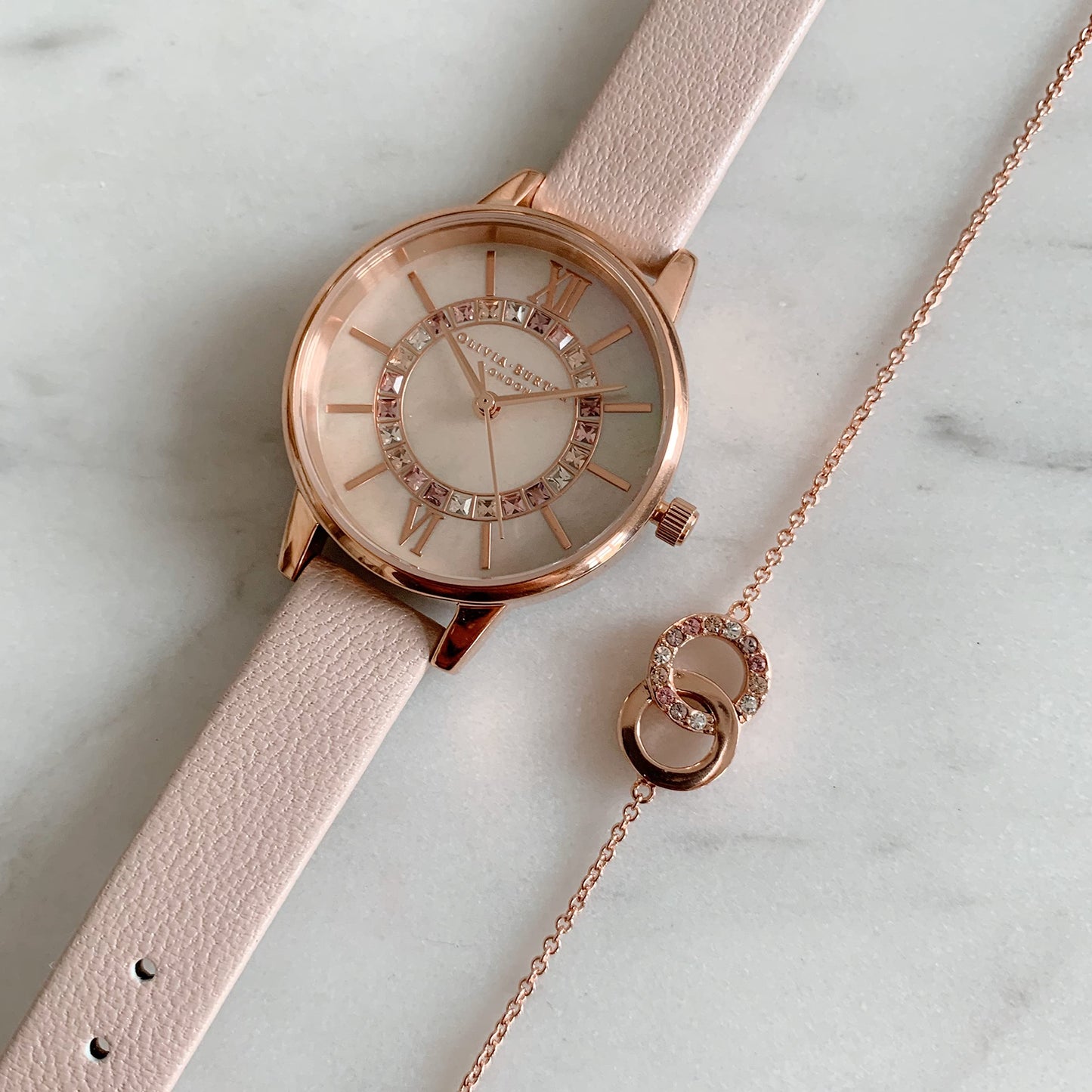 Olivia Burton Wonderland Qtz Basic Blush Mother of Pearl & Stone Round Dial Women's Analog Watch|Pearl Pink Leather Material|Pink Color Band - OB16WD93