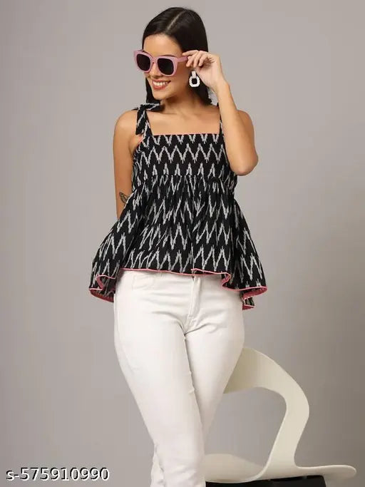 FABRIC FITOOR Trendy Black Ikat Printed Cotton Flared Sleeveless Top for Women(Black)